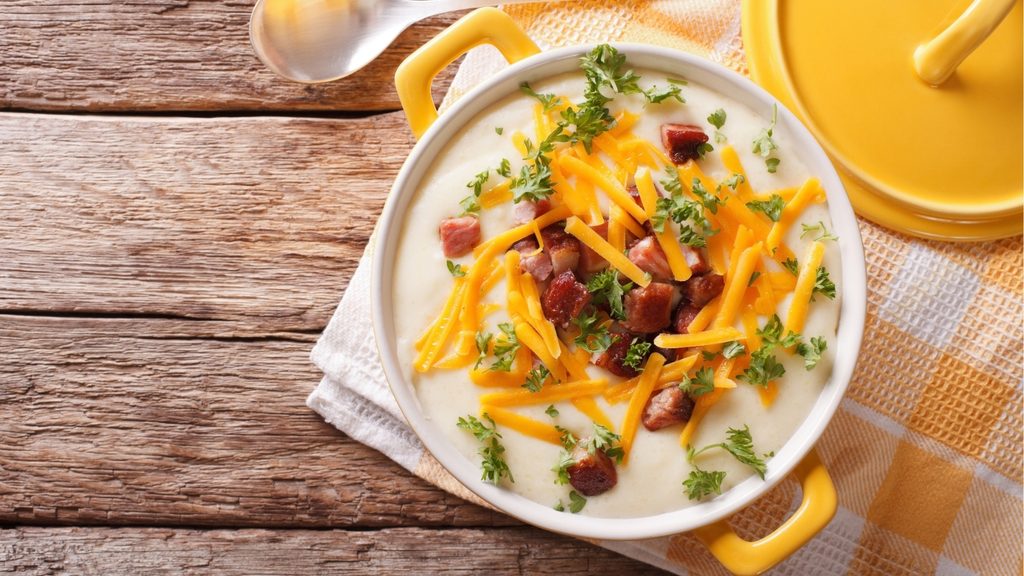 Creamy Potato Soup Top Image in Yellow Bowl